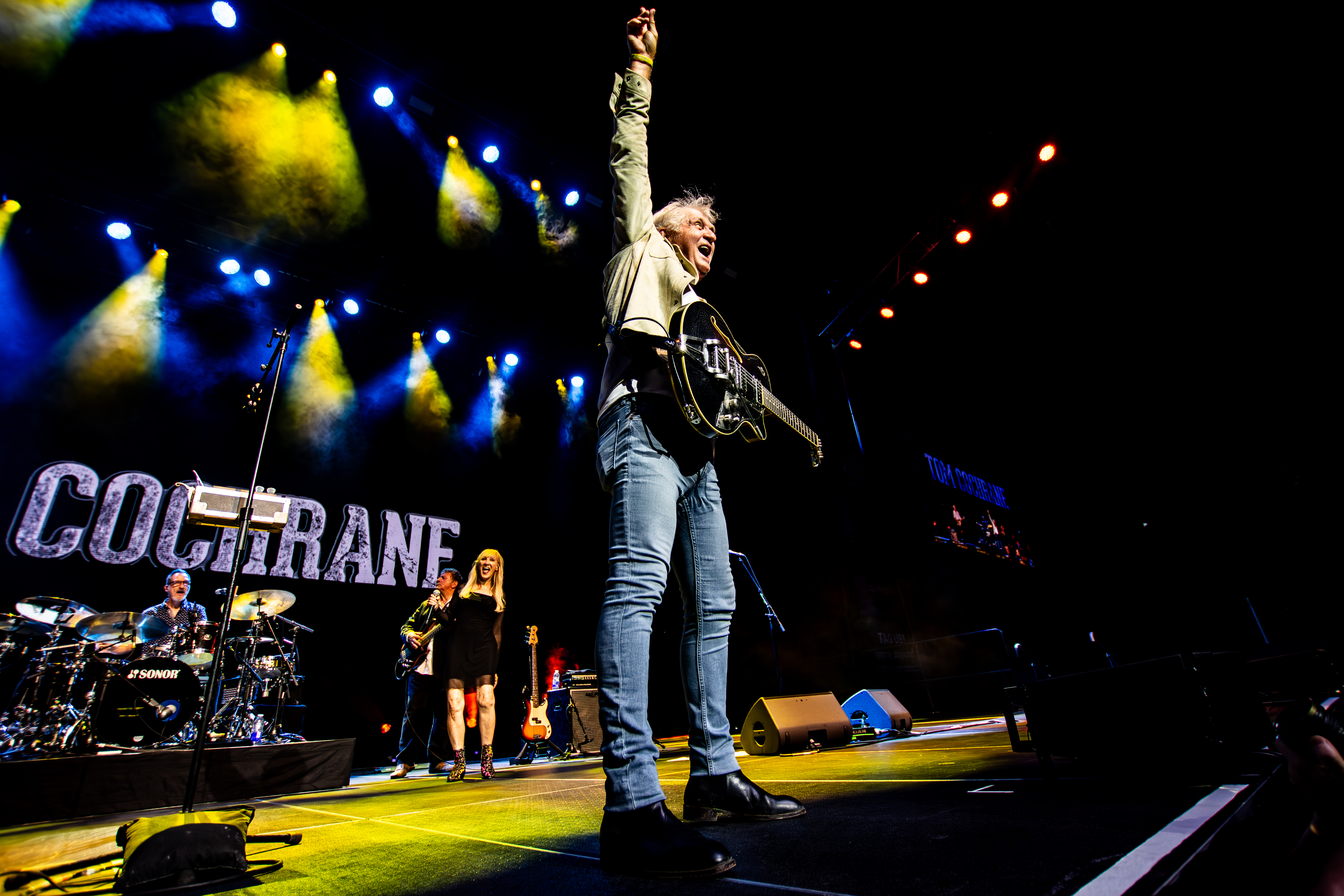 Tom Cochrane performing at PNE Summer Night Concerts, Vancouver - concert photography by Michael Caswell